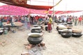 Cooks preparing food for a village feast